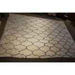 A modern black and white trellis shag pile carpet