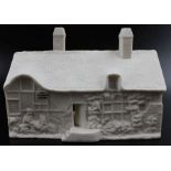 A W.H. Goss bisque ceramic model of Ann Hathaway's cottage, Shottery nr. Stratford upon Avon, having