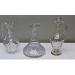 A 19th century cut glass claret jug of Classical ewer form, with stopper, a facet cut jug, and a lea