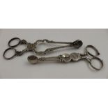 Two pairs of 18th century silver sugar tongs, a decorative Irish pair and an English pair, possibly