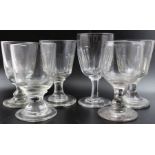 A collection of six various rummers / wine glasses, some plain, some panel cut, each stemmed on circ