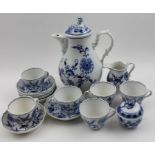 A part Meissen coffee set, comprising six cups and saucers, cream jug, and a lidded bowl, together w