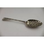 A George III silver fruit serving spoon, the bowl embossed with two birds amidst bamboo, London 1814