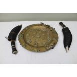A brass plate with applied cast figures and animals to include signs of the zodiac (24cm dia) & two