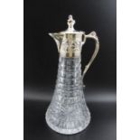 Payne & Son, a silver mounted cut lead crystal claret jug, the silver band embossed with flowers of