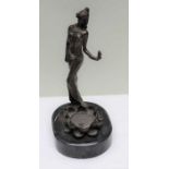 A reproduction bronze effect female figure with large lotus flower, impressed Milo on polished plint