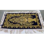 A Flowered Mehrab wall hanging in blue velvet. Embroidered with gold and silver threads and semi-pre