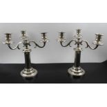 A pair of late 19th century French silver plated three branch table candelabra,