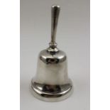 Deakin & Francis Ltd. A late Victorian silver table bell, Birmingham 1909, 72g