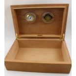 A 20th century Humidor, burr maple veneer, cedar lined with hydrometer fitted inside the hinged lid,