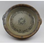 A Toft studio pottery large shallow bowl, fitted under rim handles
