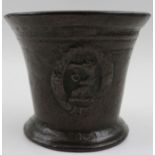 A 17th century English bronze mortar, cast on either side with the crest of a bird holding a key in