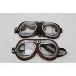 A pair of reproduction Aviators goggles both stamped with tag England