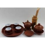 A late 20th century Chinese red clay tea ceremony set, impressed and calligraphic inscriptions, comp