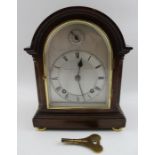 An early 20th century mahogany cased mantel clock of Georgian design