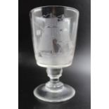 A 19th century rummer glass, engraved with a sailing ship, raised on a short stem and platform foot,