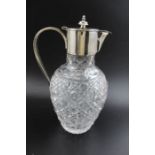 A 20th century cut glass claret jug with plain silver plated mount, combining collar, hinged cover a