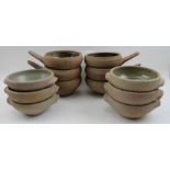A set of six Winchcombe pottery, single handled stoneware bowls, together with a set of six two hand