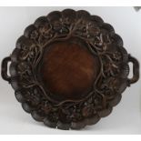 A Continental carved wood tray, petal rim, deeply carved floral border in the Art Nouveau taste, hav