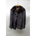 A mink fur short jacket, professionally relined together with a Danish soft pelt short jacket