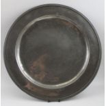 A pewter charger by Christopher Baldwin of Wigan (1690-1725) bears touch marks, 40cm in diameter
