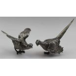 Edward Barnard & Sons Ltd. A pair of cast silver pheasants,