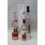 Two bottles of Ouzo with a bottle of pear liqueur, plus a bottle of fruit brandy eau de vie