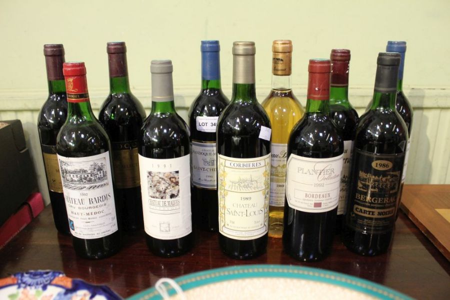 Eleven bottles of miscellaneous wine