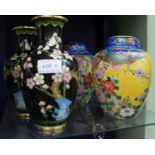 A pair of black cloisonne vases together with two yellow vases