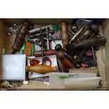 A box of bar items, etc. the majority corkscrews