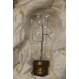 A Coronation Souvenir light bulb with 'ER' and crown filament, inscribed "Coronation Souvenir 1953"