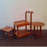 Two small arts and crafts tables with tea trolley.