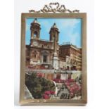 A Victorian silver fronted photograph frame, the rectangular frame featuring openwork bow to top,