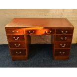 A walnut eight draw desk with red leather insert to top IMPORTANT: Online viewing and bidding