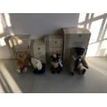 Four Steiff Club stuffed animal toys in boxes to including Captain Mach the Concorde Bear, Siamy Cat