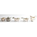 A collection of hallmarked silverware, to include a pair of sauce boats, a sugar bowl, possibly