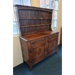 *A reproduction oak dresser