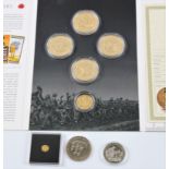 A set of five World War One Centenary gold plated coins to include 'The Battle of Ypres' coin, along