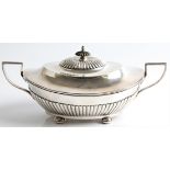 A late 19th Century Gorham tureen, having gadrooned lower body and raised on four ball feet,