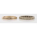 A diamond half eternity ring, bar set with eleven diamond accents, stamped 9kt, ring size O1/2,