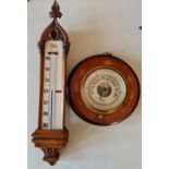 A Bailey oak case gothic style wall barometer together with a Selfridge London wall barometer