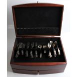 A collection of George III silver flatware, each piece with engraved stag to terminal, to include