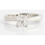 A hallmarked platinum diamond solitaire ring, set with a princess cut diamond, measuring approx. 1.