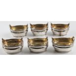 A set of six George III silver salts, each of barrel design and engraved with monogram to front,