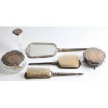 A dressing table set of matching design with engraved initial, comprising a mirror, a hair brush,