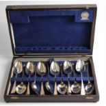 Twelve Georgian silver spoons, each engraved with nautical design to terminal, hallmarks very