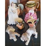 A Royal Worcester Queen Elizabeth II figurine and a Royal Doulton figurine with signature to base,