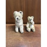 Two early Steiff stuffed animals, a dog and a bear, with buttons in ear, approx height 10cm and