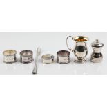 A collection of hallmarked silverware, to include a Mappin & Webb pickle fork, a christening cup,