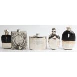 Two hallmarked silver hipflasks, one of oval design the other of curved rectangular design, together